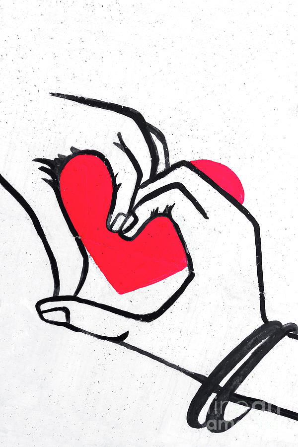 600x900 hands painted on grungy wall forming a heart drawing