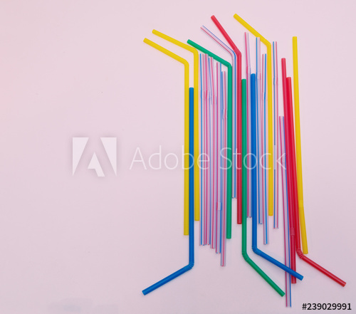 500x441 lot of different colorful vivid drink straws on pink background