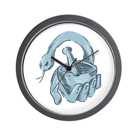 460x460 hand holding mortar pestle snake drawing wall clocks
