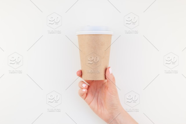 640x427 Creative Mock Up Image Of Woman Hand Holding Craft Paper Coffee
