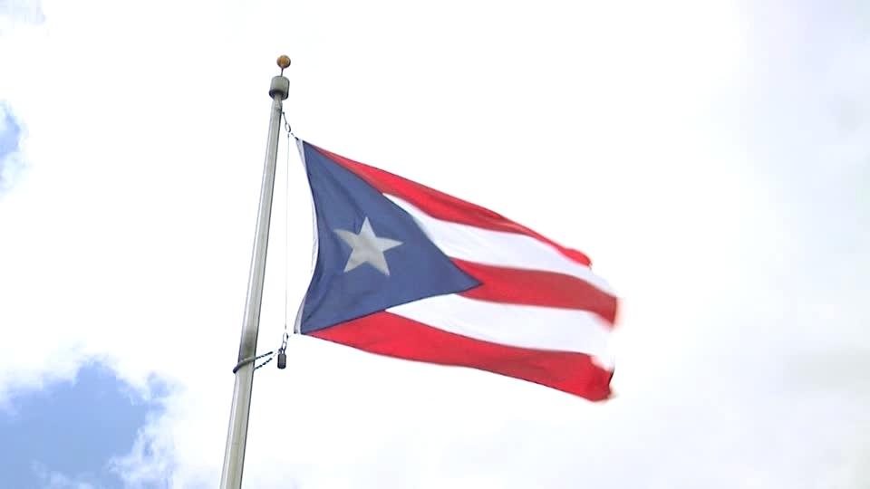960x540 rican flag flag against a blue sky in stock photo puerto rico flag