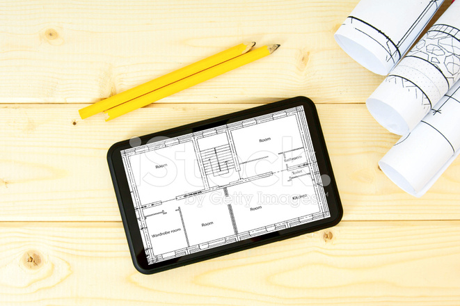 661x440 Tablet, Drawings And Pencils On A Wooden Background Stock Photos