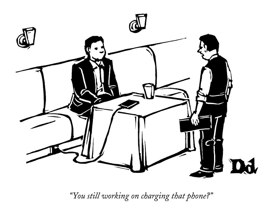 900x713 a man sits at a restaurant table drawing