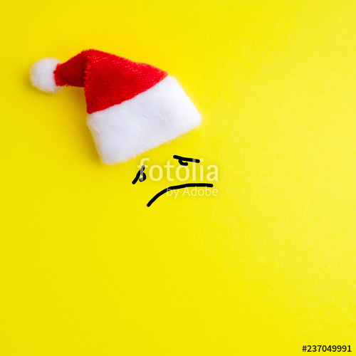 500x500 Emotion Of Sad Face Expression And Red Santa Claus Hat On Yellow