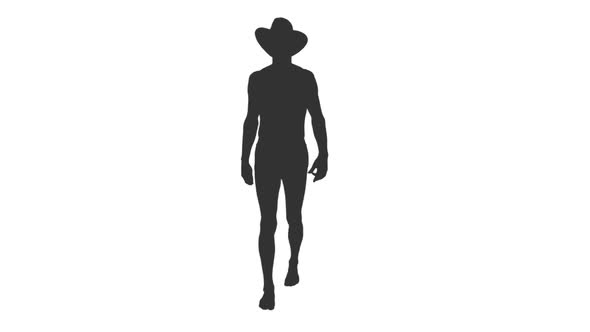 590x332 Silhouette Of Shirtless Man Walking In Swim Trunks And Cowboy Hat