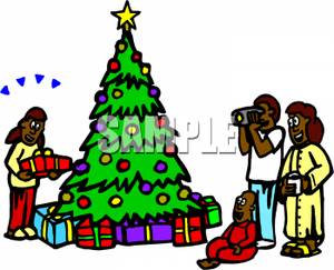 300x243 African American Family Gathered Around A Christmas Tree Clip Art