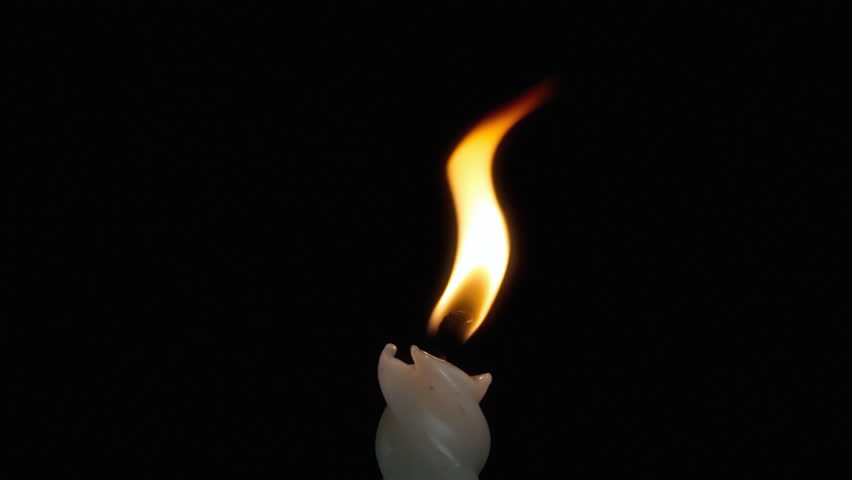 852x480 Candle Flame Against Black Background Stock Footage Video 11793926