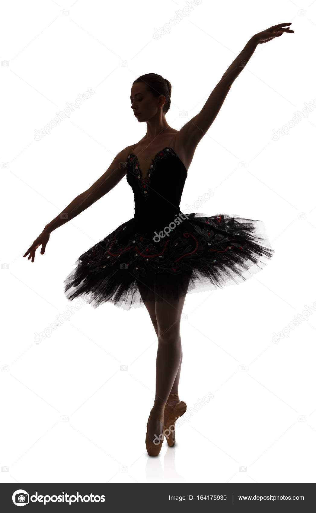 1047x1700 Ballerina Silhouette Making Ballet Position Arabesque Against