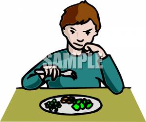 300x250 Image A Grumpy Child At Dinnertime, Refusing To Eat His Peas