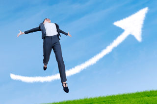 320x213 Happy Businesswoman Jumping In Success