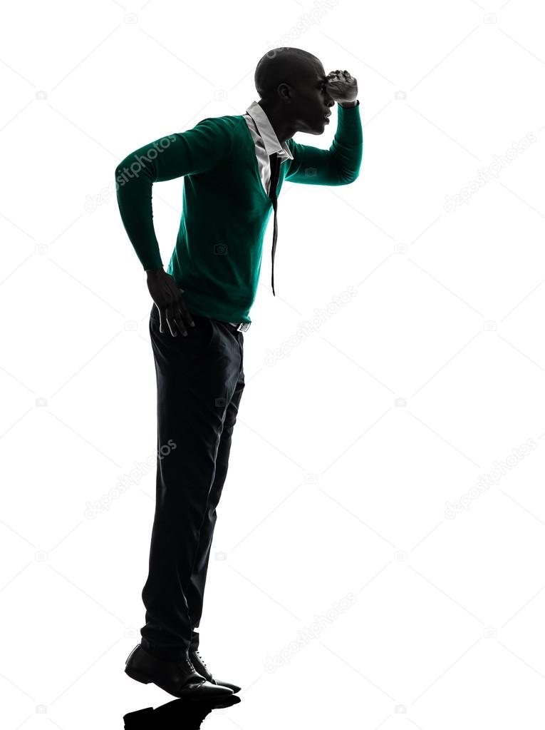 765x1023 African Black Man Standing Tiptoe Looking Away Silhouette Stock