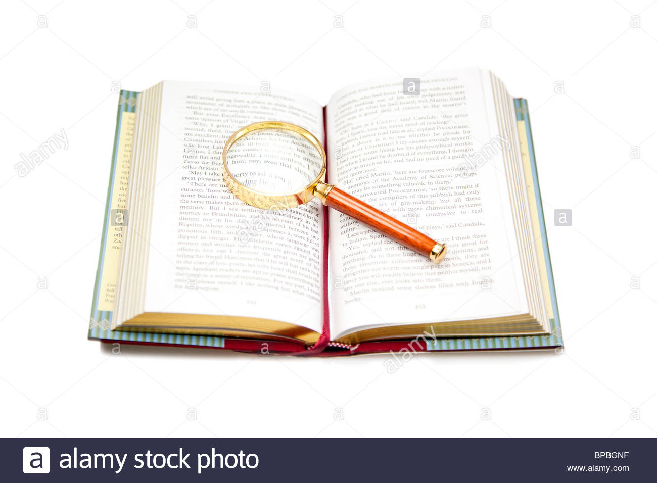 1300x956 Open Book With Magnifying Glass Isolated On White Stock Photo