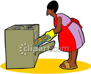 300x244 Woman Taking Cookies Out Of The Oven