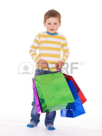 337x450 A Little Boy Holding A Colorful Bags For Shopping, Looking Back