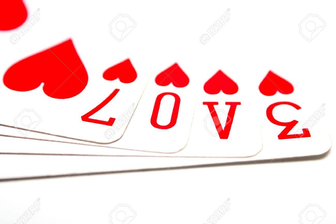 1300x866 Love Spelled Out In The Symbols Of Playing Cards Stock Photo
