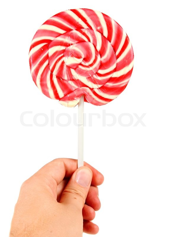 575x800 Candy Pink Spiral Lollipop In Hand Stock Photo Colourbox