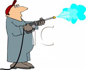 300x243 Worker Using A Pressure Washer