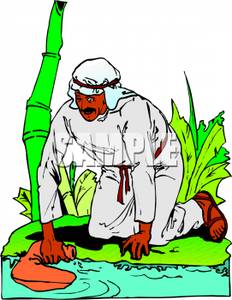 232x300 Ethnic Man Filling A Water Skin At A River