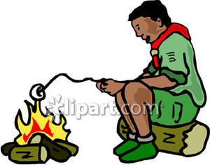300x236 Boy Roasting A Marshmallow Over A Campfire