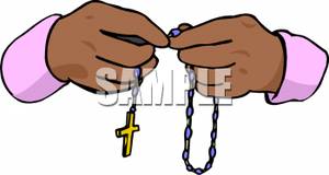 300x160 Holding Rosary Beads