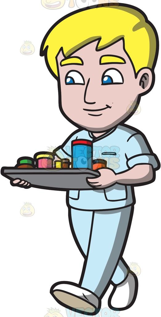 522x1024 Young Man Wearing Scrubs Standing With His Hands On His Hips