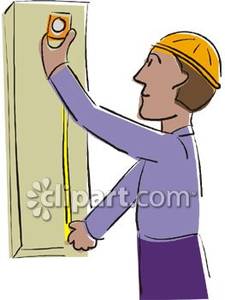 225x300 Man Measuring A Piece Of Wood With A Tape Measure