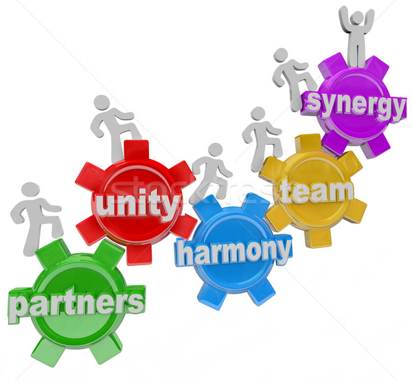 600x553 Synergy Partners Working Together In Teamwork For Success Stock