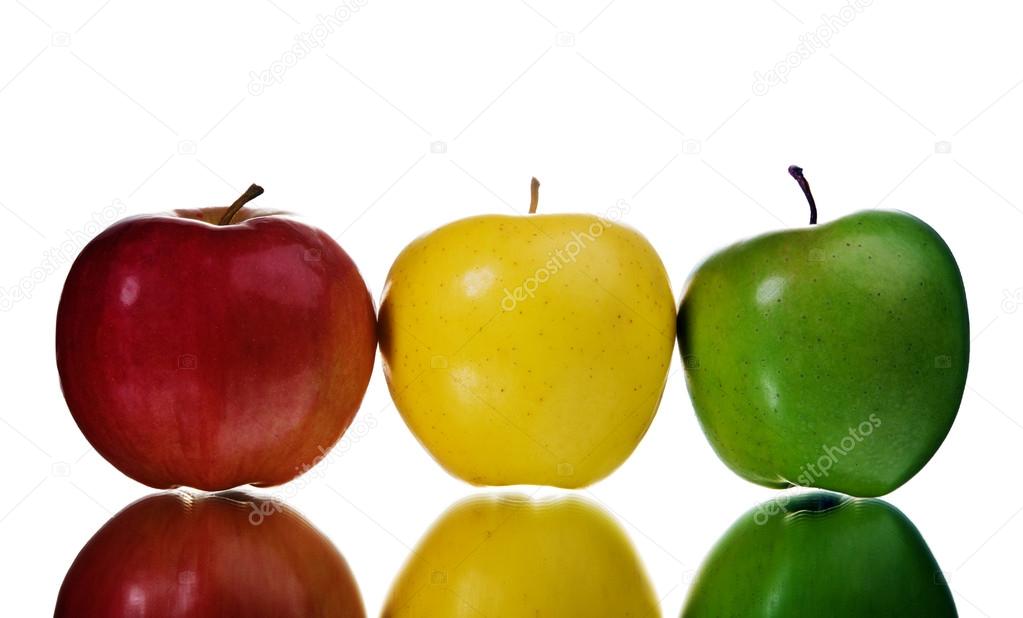 1023x618 A Green, Red And Yellow Apple In A Row Stock Photo Tropper